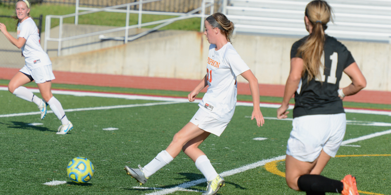 Stump penalty kick powers women's soccer to first win